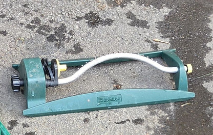 Arrosoir Melnor avec boyau 30'