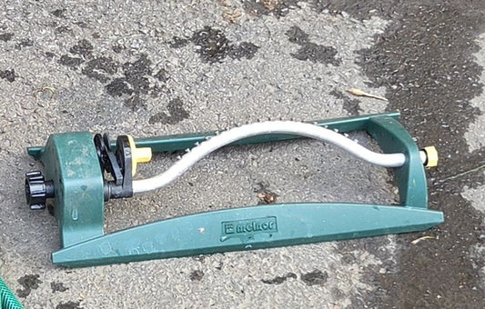 Arrosoir Melnor avec boyau 30'