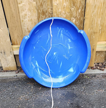 Luge en plastique rond